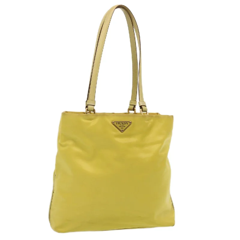 Prada tote bags with a printed Prada logo on the front for brand visibilityPrada tote bags with a printed Prada logo on the front for brand visibilityPRADA Tote Bag Nylon Yellow Auth 73333