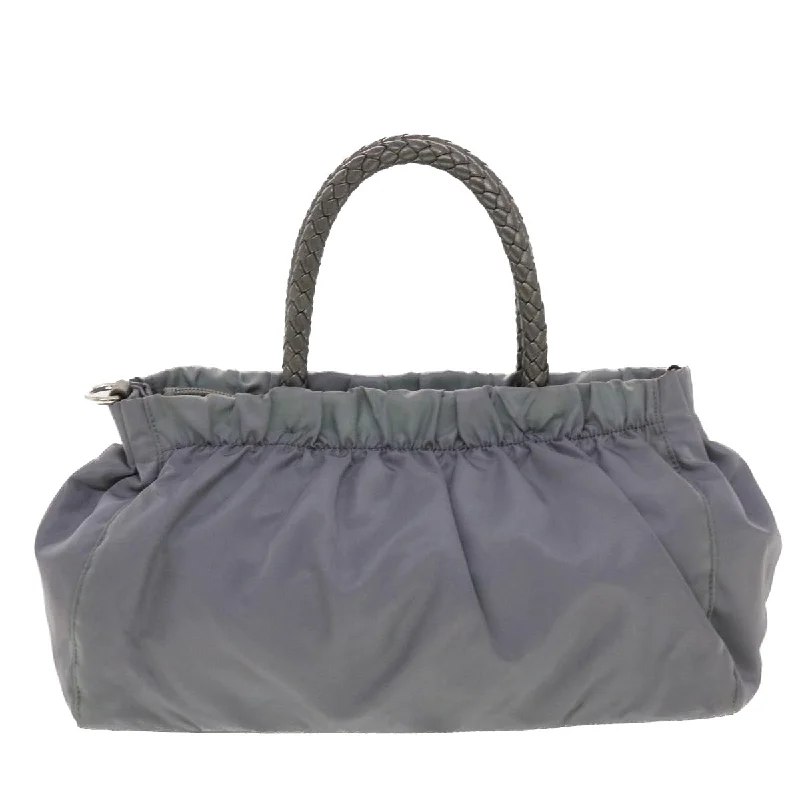 Prada bags with a front - zip pocket for small items like cards and keysPrada bags with a front - zip pocket for small items like cards and keysPrada Hand Bag Nylon Gray  40329