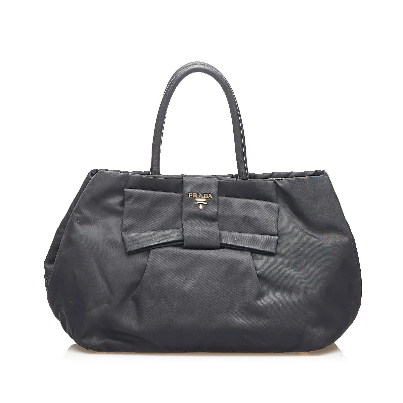 Prada bags with a zippered interior pocket for separating itemsPrada bags with a zippered interior pocket for separating itemsPrada Tessuto Bow Handbag 31524