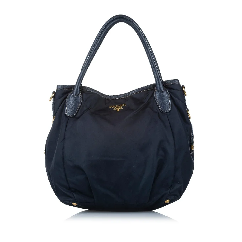 Prada Cahier bags with a detachable shoulder strap for versatile carryingPrada Cahier bags with a detachable shoulder strap for versatile carryingPrada Tessuto Tote Bag (SHG-16632)