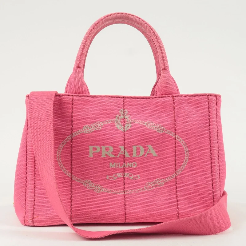 Prada Cleo bags with a snakeskin - effect panel for a bold and trendy lookPrada Cleo bags with a snakeskin - effect panel for a bold and trendy lookPRADA Canapa Mini Canvas 2Way Tote Bag Pink 1BG439