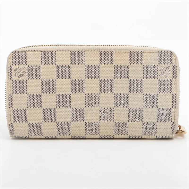 Women Gucci crossbody bags with a woven leather strapLouis Vuitton Damier Azur Zippy Long Wallet