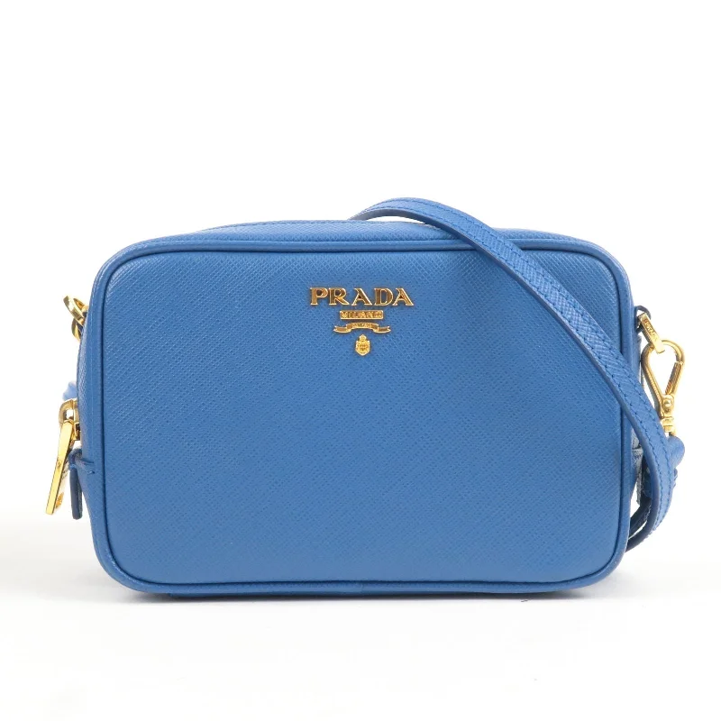 Prada Cahier bags with a monogram - embossed leather surfacePrada Cahier bags with a monogram - embossed leather surfacePRADA Logo Leather Shoulder Bag Mini Bag Blue 1N1674