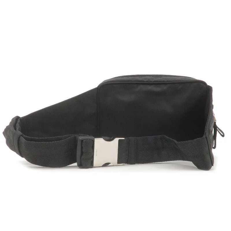 Prada Cahier bags featuring the signature triangular logo plaquePrada Cahier bags featuring the signature triangular logo plaquePRADA Logo Nylon Waist Bag Belt Bag Fanny Pack NERO Black 2VL001