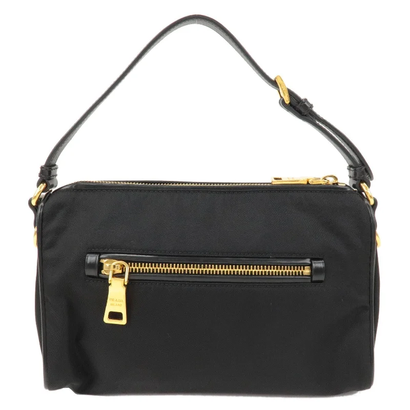 Prada tote bags with a spacious interior and a magnetic - snap closurePrada tote bags with a spacious interior and a magnetic - snap closurePRADA Logo Nylon Leather Shoulder Bag Hand Bag Black BN1834