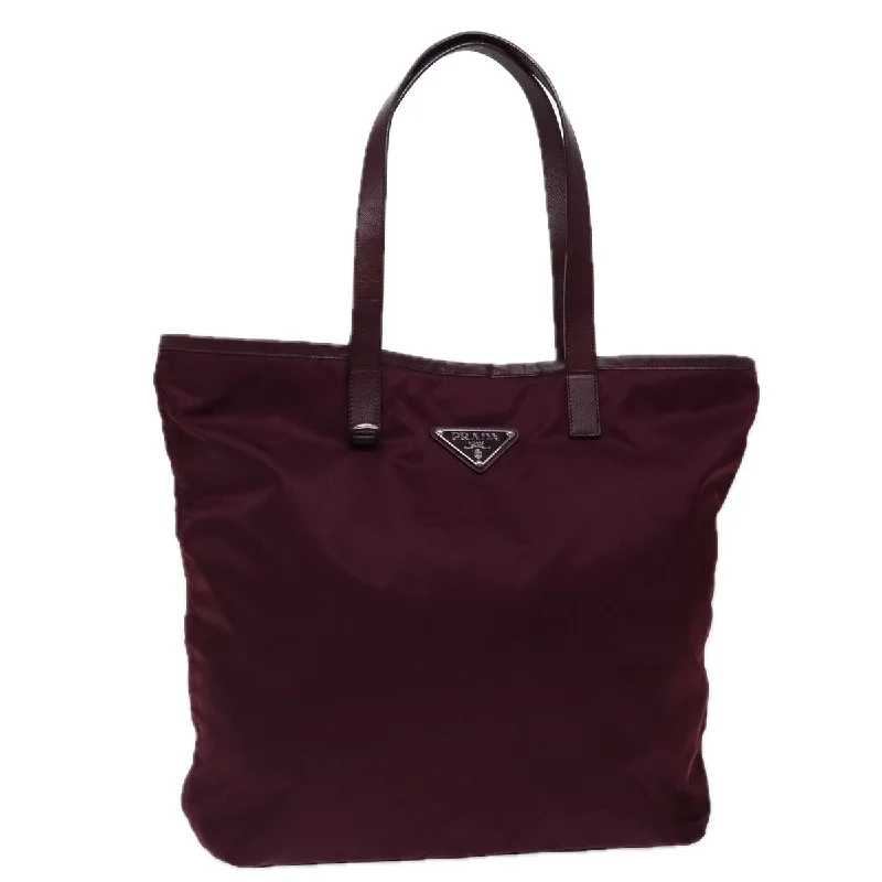 Prada Cleo bags with a crystal - embellished logo for added luxuryPrada Cleo bags with a crystal - embellished logo for added luxuryPRADA Tote Bag Nylon Wine Red Auth ki4335