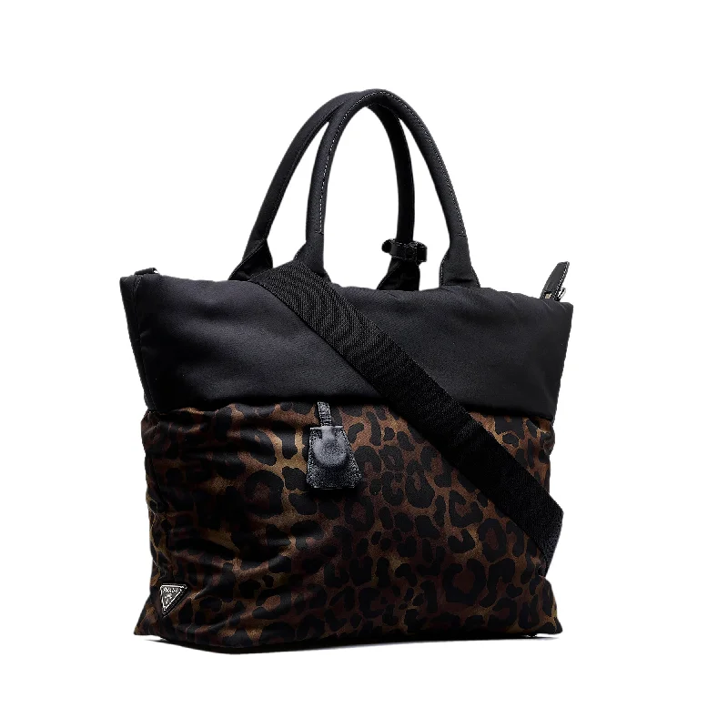 Ladies Prada handbags with a detachable wallet inside for added convenienceLadies Prada handbags with a detachable wallet inside for added conveniencePrada Tessuto Reversible Leopard Print Satchel