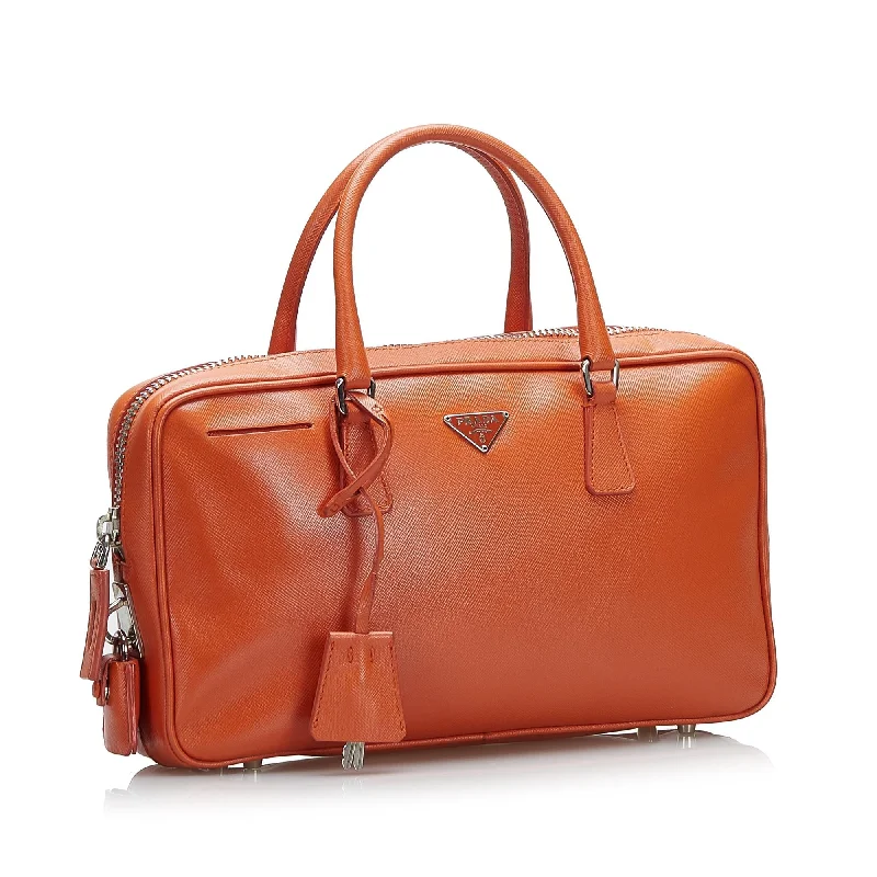 Prada Cleo bags with a contrast - colored interior for visual interestPrada Cleo bags with a contrast - colored interior for visual interestPrada Saffiano Leather Handbag 36105