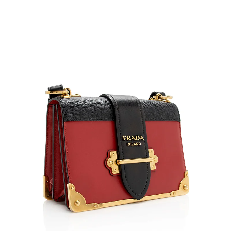 Prada crossbody bags in a vibrant red for a bold fashion statementPrada crossbody bags in a vibrant red for a bold fashion statementPrada Saffiano Leather Cahier Shoulder Bag 21606