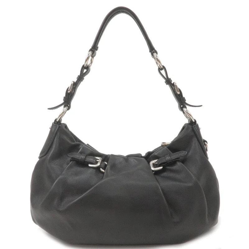 Prada tote bags with a spacious interior and a magnetic - snap closurePrada tote bags with a spacious interior and a magnetic - snap closurePRADA Soft Calf Leather Shoulder Bag Black BR3795