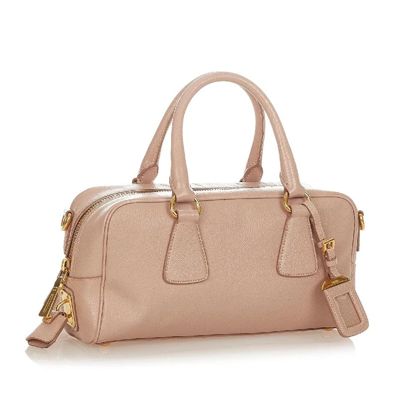 Prada bags with a chain - link trim and a leather body for a modern and stylish edgePrada bags with a chain - link trim and a leather body for a modern and stylish edgePrada Saffiano Bauletto Satchel 26267