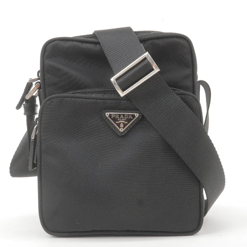 Ladies Prada handbags with a detachable wallet inside for added convenienceLadies Prada handbags with a detachable wallet inside for added conveniencePRADA Logo Nylon Leather Shoulder Bag NERO Black BT0169