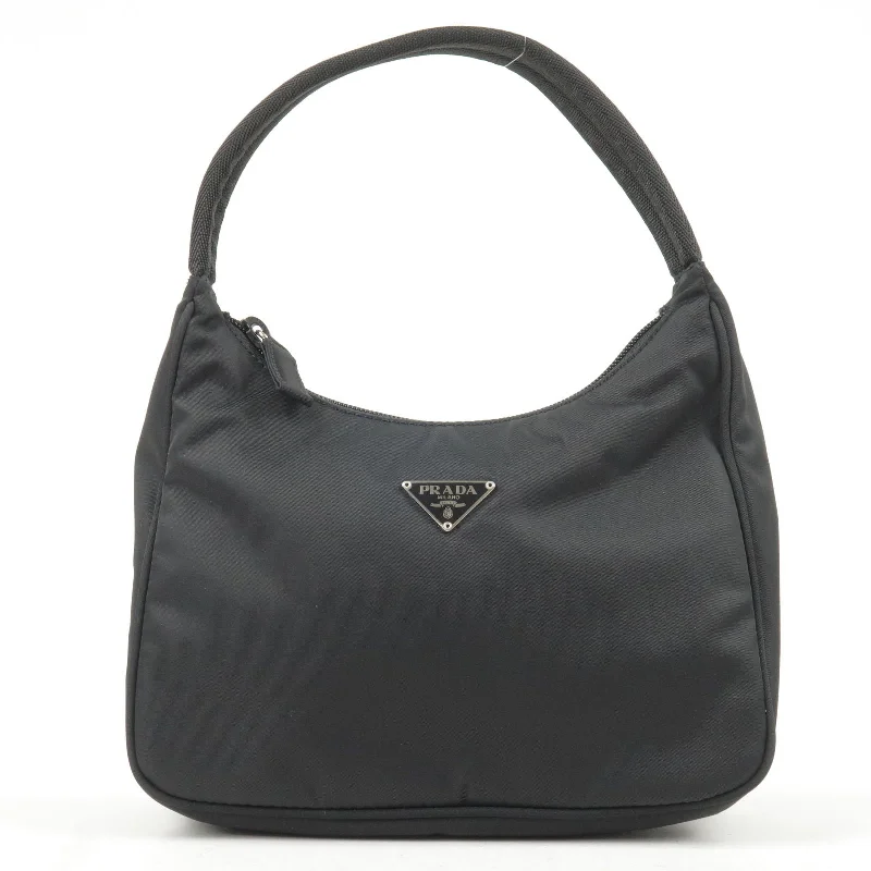 Ladies Prada Galleria bags with a detachable shoulder strapLadies Prada Galleria bags with a detachable shoulder strapPRADA Logo Nylon Hand Bag Mini Bag NERO Black MV519