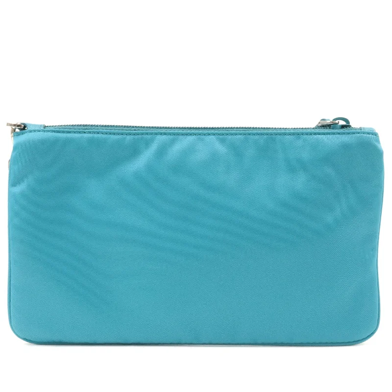 Prada bags with a detachable mobile phone holder for on - the - go conveniencePrada bags with a detachable mobile phone holder for on - the - go conveniencePRADA Logo Nylon Leather Clutch Bag Pouch Turquoise 1NH545