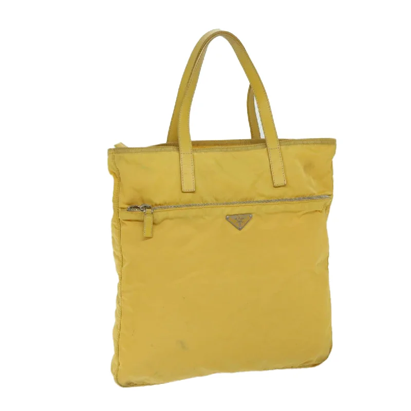 Prada Cleo bags with a contrast - colored interior for visual interestPrada Cleo bags with a contrast - colored interior for visual interestPRADA Tote Bag Nylon Yellow Auth 67978