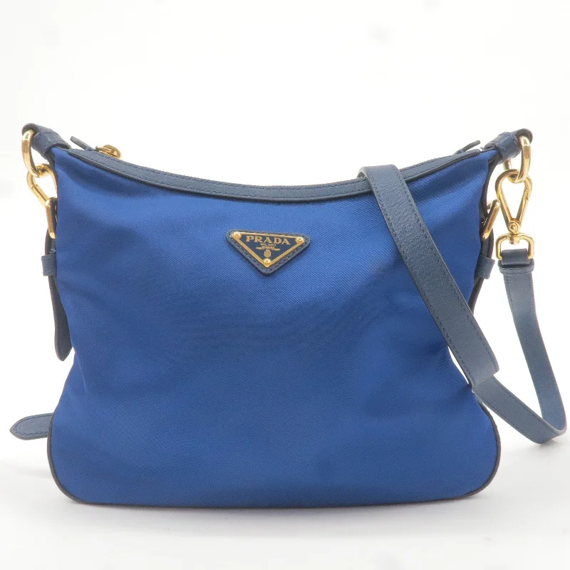 Ladies Prada Galleria bags with a textured leather surface for a more tactile lookLadies Prada Galleria bags with a textured leather surface for a more tactile lookPRADA Logo Nylon Leather Shoulder Bag Blue BT0706