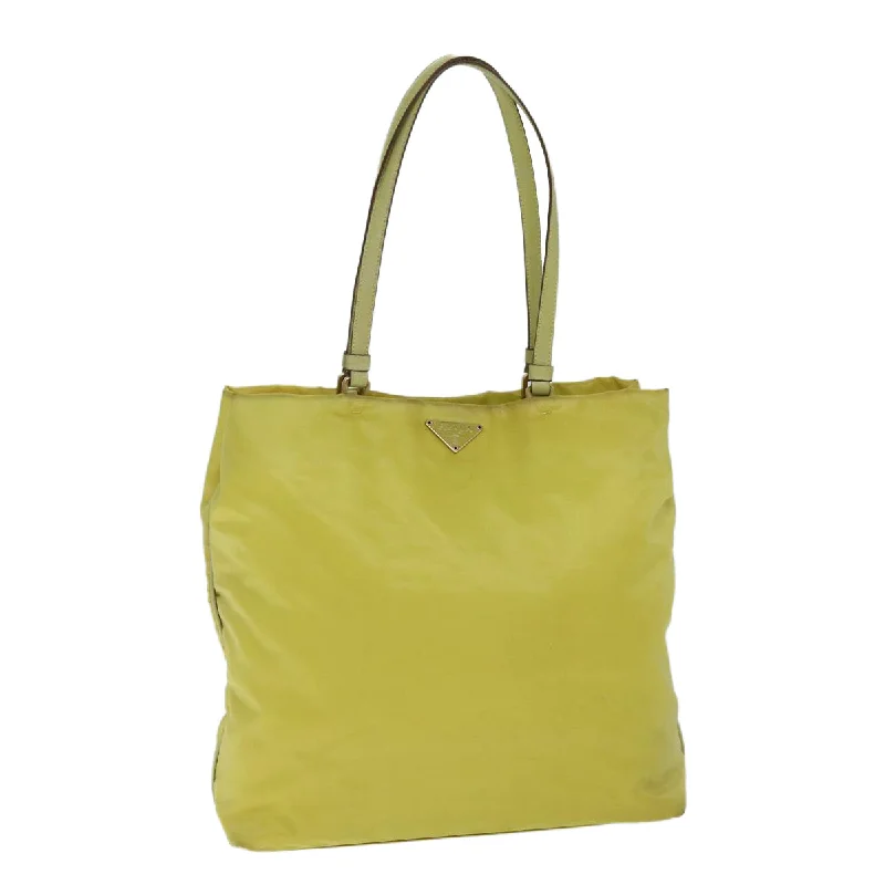 Ladies Prada Re - Edizione 2005 bags with a star - shaped charm for a playful touchLadies Prada Re - Edizione 2005 bags with a star - shaped charm for a playful touchPRADA Tote Bag Nylon Yellow Auth 77355