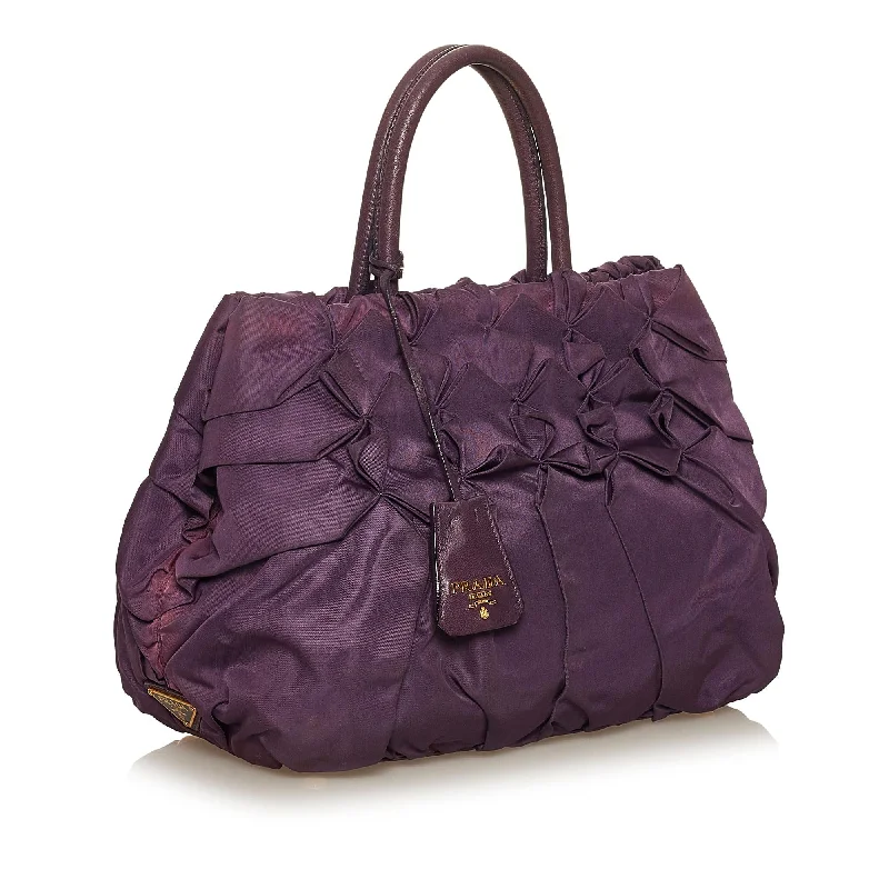 Prada bags with a zip - top closure and multiple interior pockets for organizationPrada bags with a zip - top closure and multiple interior pockets for organizationPrada Ruffled Tessuto Tote Bag 29363