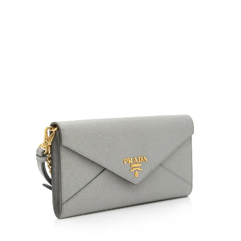 Prada Cahier bags with a monogram - embossed leather surfacePrada Cahier bags with a monogram - embossed leather surfacePrada Saffiano Leather Envelope Wallet on Chain Bag 97HrAQ