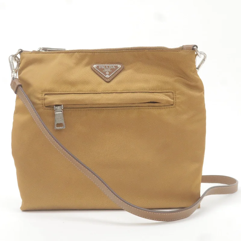 Ladies Prada handbags with a detachable wallet inside for added convenienceLadies Prada handbags with a detachable wallet inside for added conveniencePRADA Logo Nylon Leather Shoulder Bag Crossbody Bag Brown