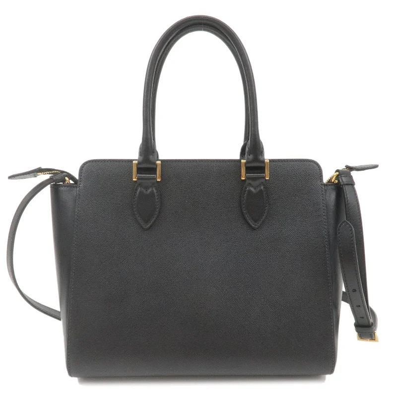 Ladies Prada Galleria bags with gold - toned hardware for a luxurious touchLadies Prada Galleria bags with gold - toned hardware for a luxurious touchPRADA Leather 2Way Shoulder Bag Hand Bag NERO Black 1BA113