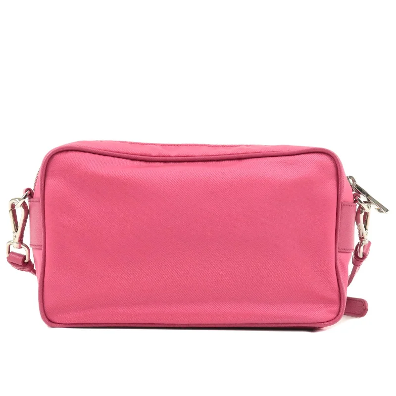 Prada Cahier bags with a leather - wrapped handle for a luxurious feelPrada Cahier bags with a leather - wrapped handle for a luxurious feelPRADA Logo Nylon Leather Crossbody Shoulder Bag FUXIA Pink BT1010