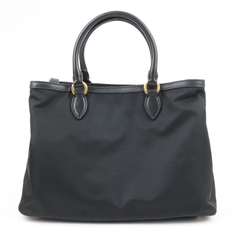 Prada tote bags with a double - handle and shoulder - strap option for easy usePrada tote bags with a double - handle and shoulder - strap option for easy usePRADA Logo Nylon Leather 2Way Bag Hand Bag NERO Black 1BA579