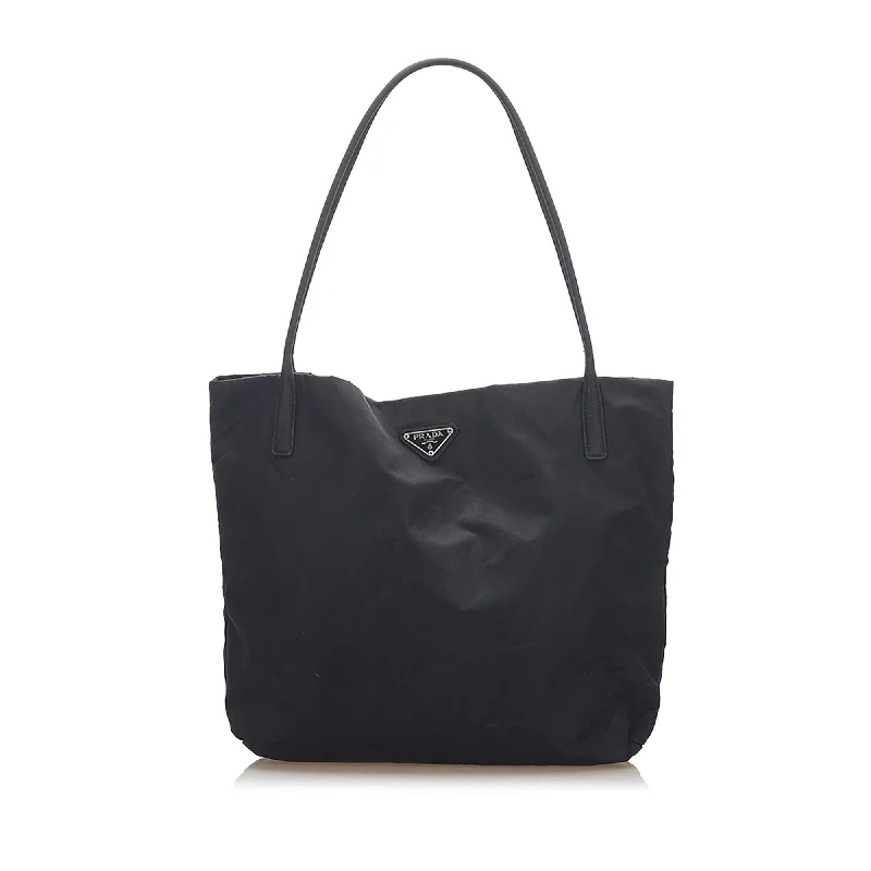 Prada Cahier bags featuring the signature triangular logo plaquePrada Cahier bags featuring the signature triangular logo plaquePrada Tessuto Tote Bag (SHG-17296)