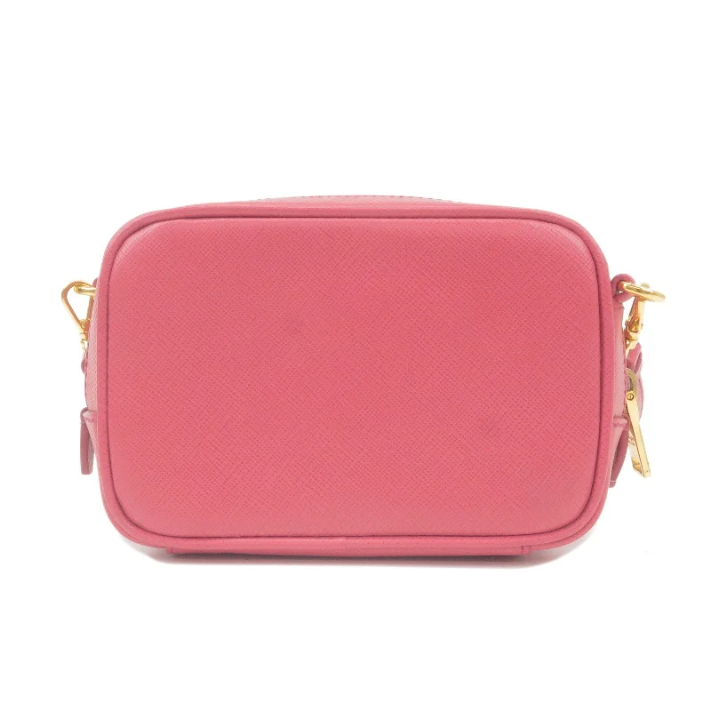 Prada Galleria bags with a structured silhouette for a professional lookPrada Galleria bags with a structured silhouette for a professional lookPRADA Logo Leather Crossbody Shoulder Bag Pink 1N1674