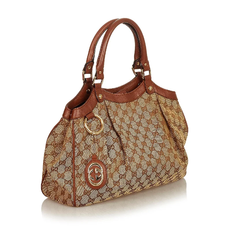 Women Gucci crossbody bags with a printed floral patternGucci GG Canvas Sukey Tote Bag (26345)