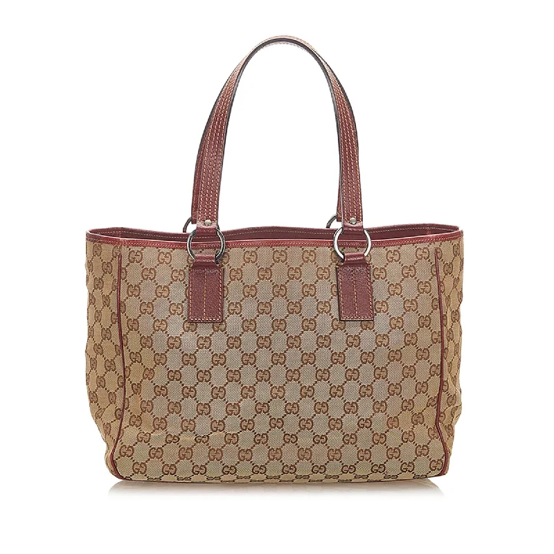 Women Gucci bags with interlocking G hardware for a classic lookGucci GG Canvas Tote Bag