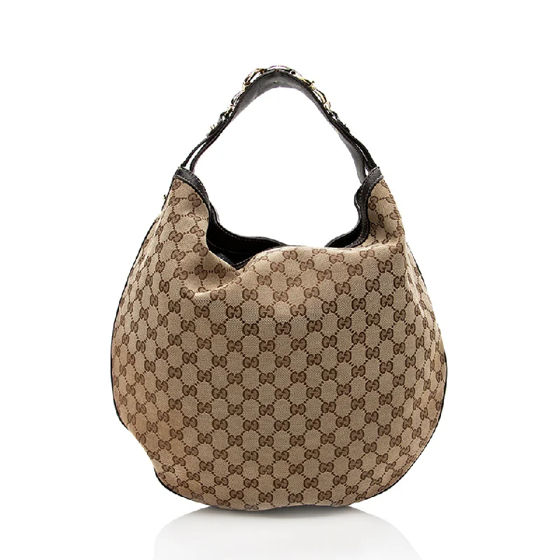 Women Gucci Sylvie bags with a detachable ribbon detailGucci GG Canvas Wave Large Hobo