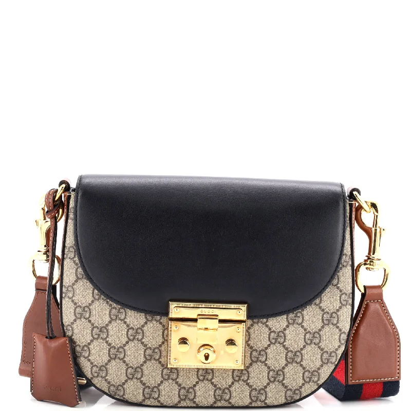 Gucci handbags for women with a patent - leather finishPadlock Saddle Shoulder Bag GG Coated Canvas and Leather Medium