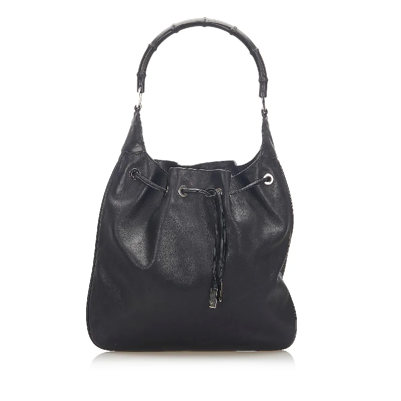 Ladies Gucci Dionysus bags with a detachable shoulder strapGucci Bamboo Drawstring Leather Shoulder Bag