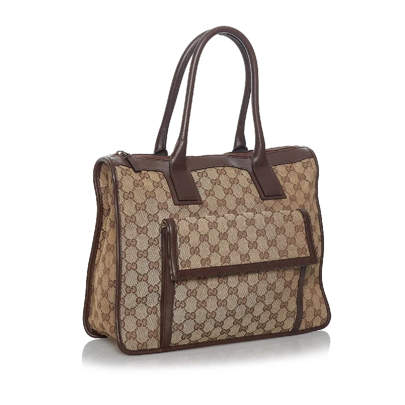 Women Gucci bags with a chain - link trim and a leather bodyGucci GG Canvas Tote bag (35084)