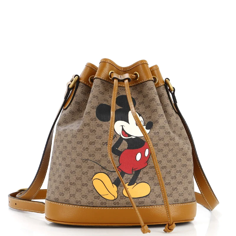 Ladies Gucci shoulder bags with a magnetic - closure flapDisney Mickey Mouse Bucket Bag Printed Mini GG Coated Canvas