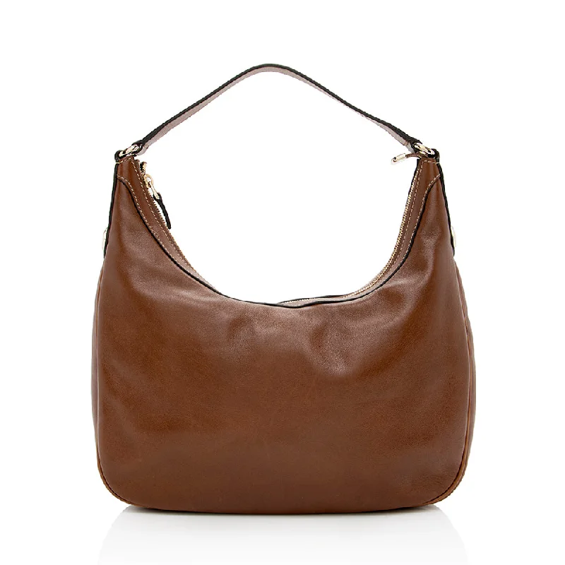 Gucci backpacks for women with a sleek silhouetteGucci Leather Charmy Small Hobo - FINAL SALE