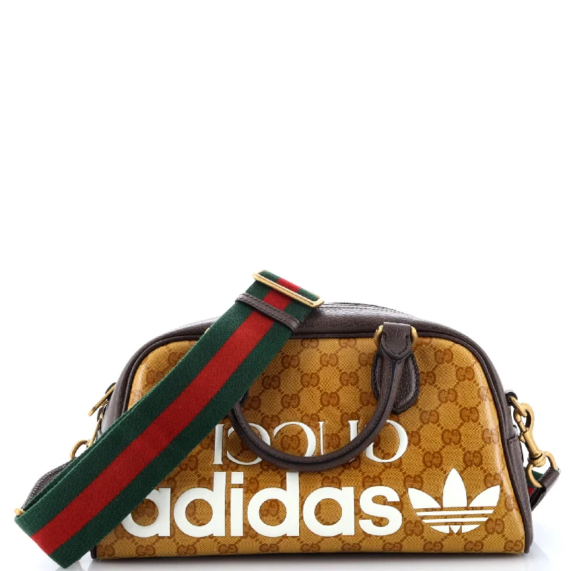 Gucci backpacks for women with a multi - pocket designx adidas Duffle Bag GG Coated Canvas Mini