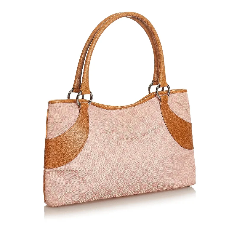 Women Gucci bags with a snap - button closure and a decorative charmGucci GG Canvas Tote Bag (25217)