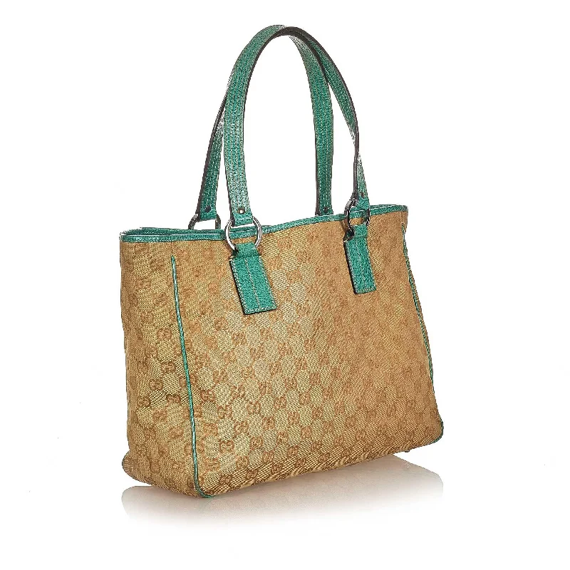 Women Gucci bags with a snap - button closure and a decorative charmGucci GG Canvas Tote Bag (22473)