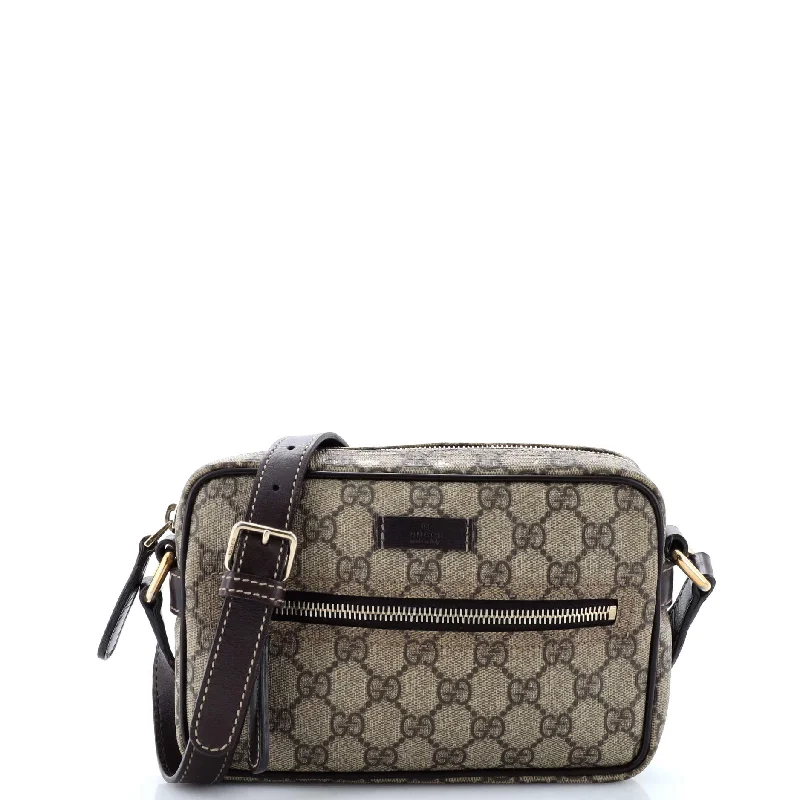 Ladies Gucci Dionysus bags with a star - shaped charmFront Zip Camera Bag GG Coated Canvas Small