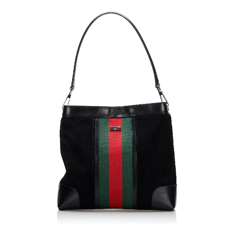 Ladies Gucci handbags with a detachable coin purse insideGucci Web Suede Shoulder Bag