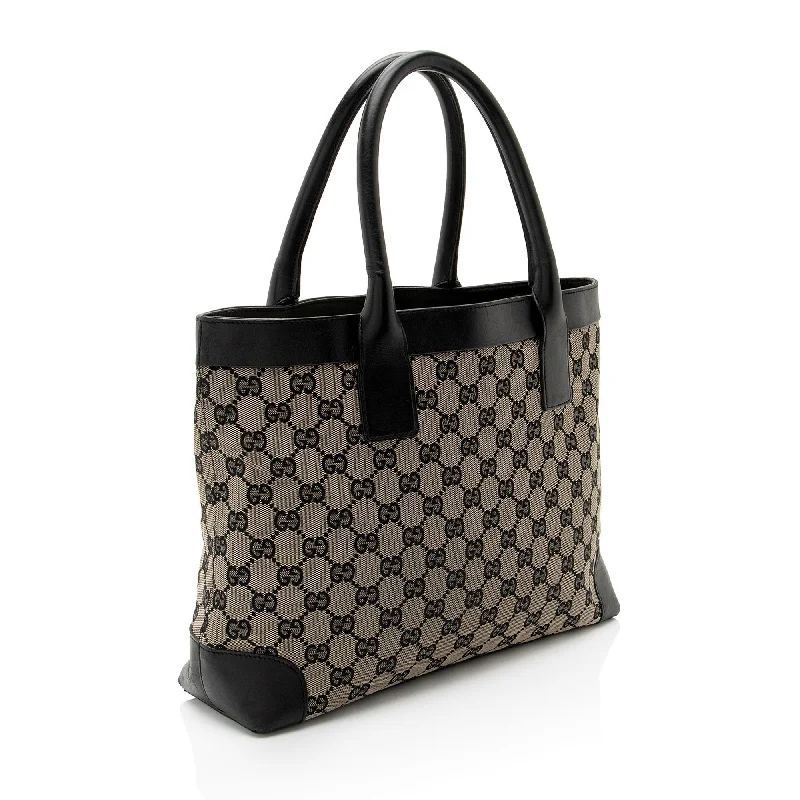 Women Gucci bags with interlocking G hardware for a classic lookGucci GG Canvas Tote (PZuc5z)