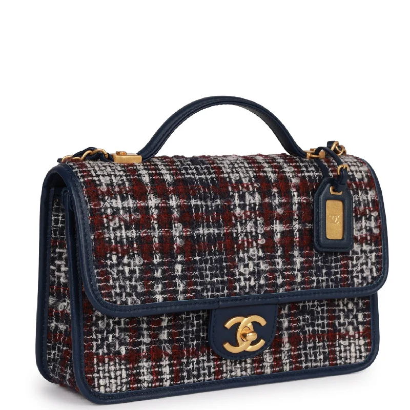 Chanel bags with the perfect balance of luxury and functionalityChanel bags with the perfect balance of luxury and functionalityPre-owned Chanel Medium School Memory Flap Bag with Top Handle Navy Multicolor Tweed Aged Gold Hardware